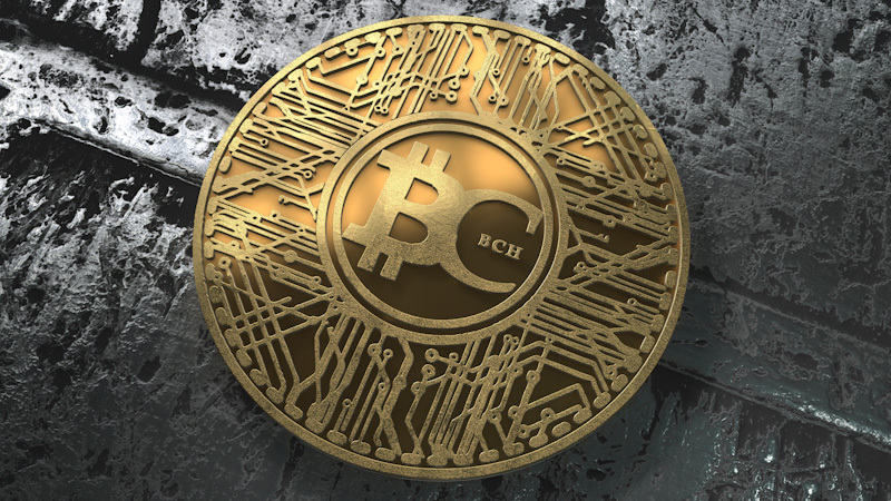 A physical bitcoin cash currency sits on a mottled black and grey background